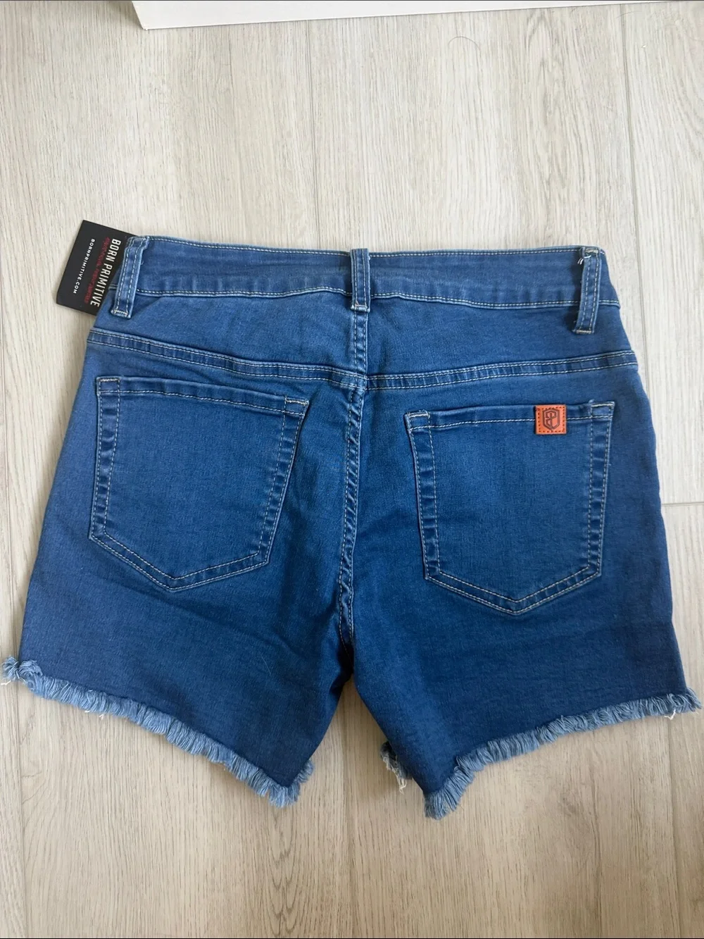 Born Primitive Dark Blue Frayed Hem Denim Shorts